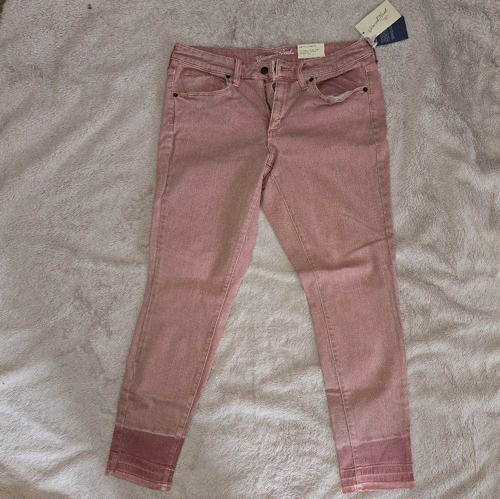 Universal Thread Mid-Rise Skinny jeans. Pastel pink color. Size 12.